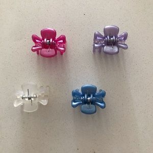 4 different colored claw clips